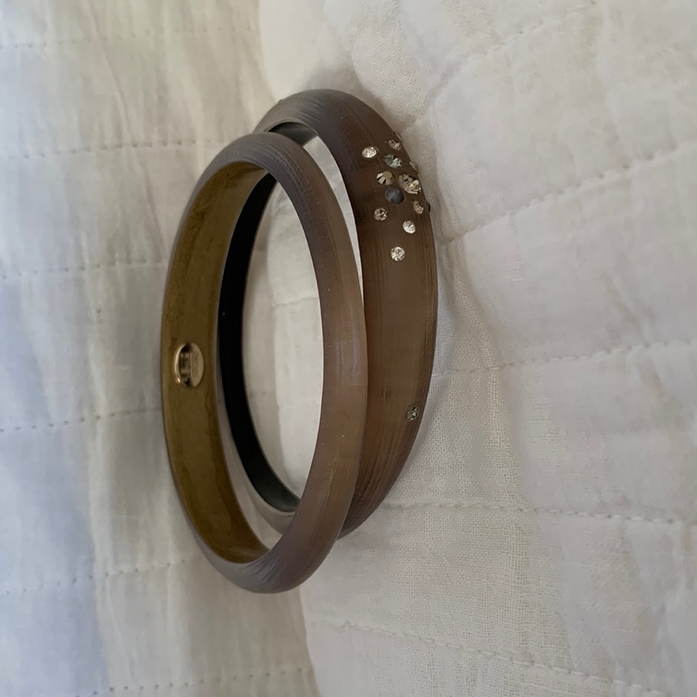 Alexis Bittar bracelets. Bronze color.